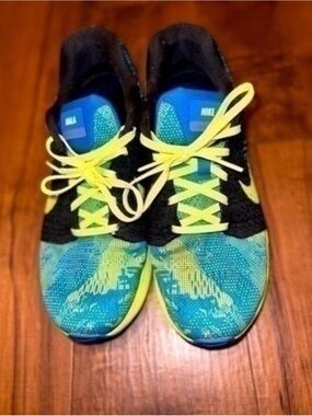 Nike women’s Blue and Yellow Athletic Sneakers